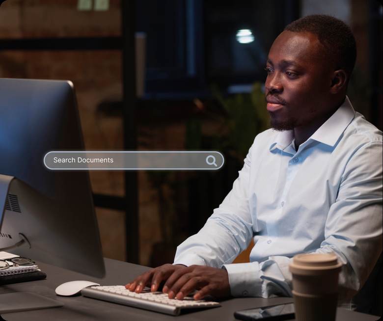 A team member searching stored documents from a desktop